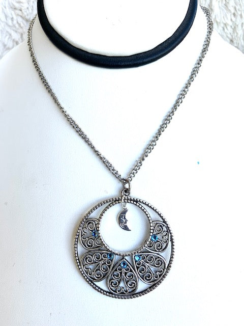 Traditional silverwork pairs with the power of the moon in this stunning  Silver Crystal pendant